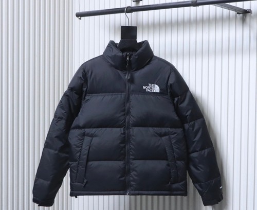 North face puffer - face,